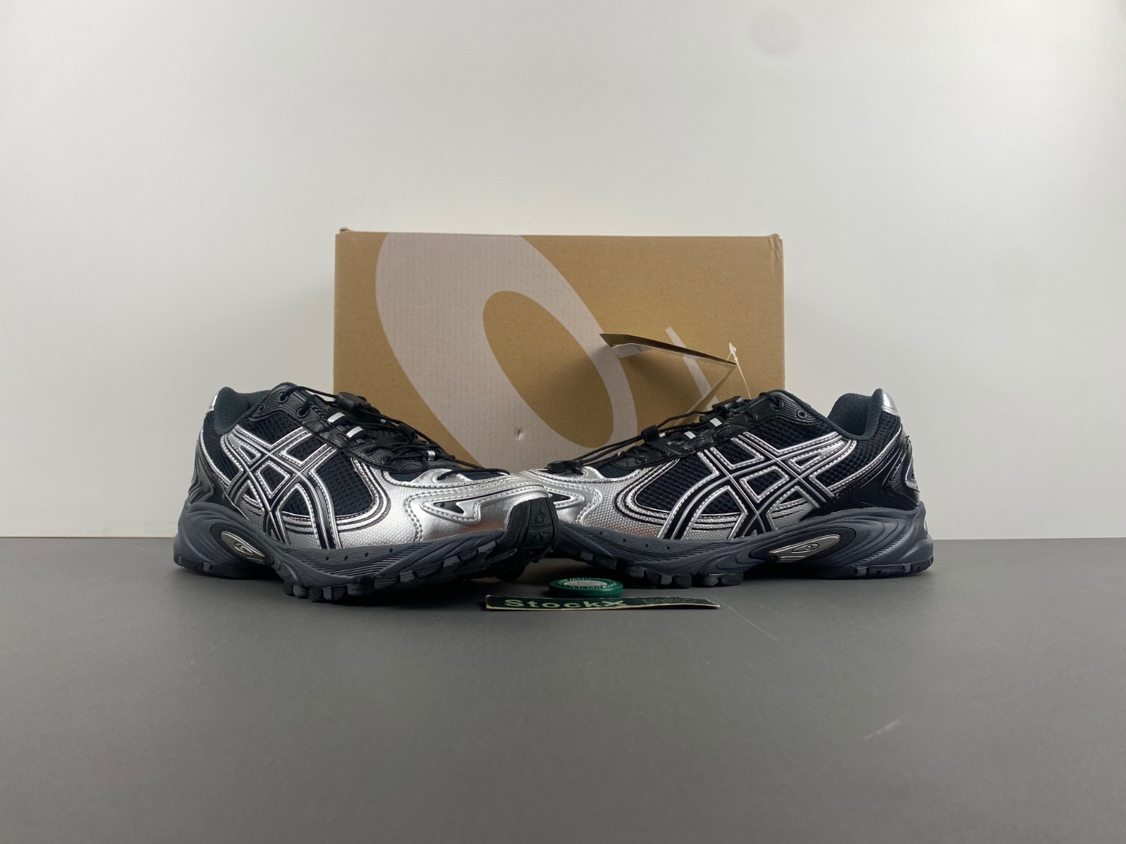 As*ic*s sneaker
