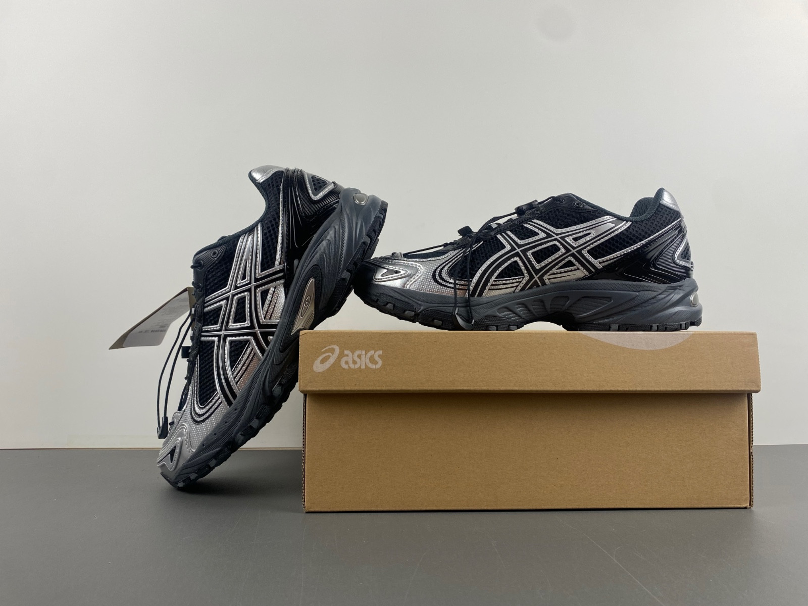 As*ic*s sneaker