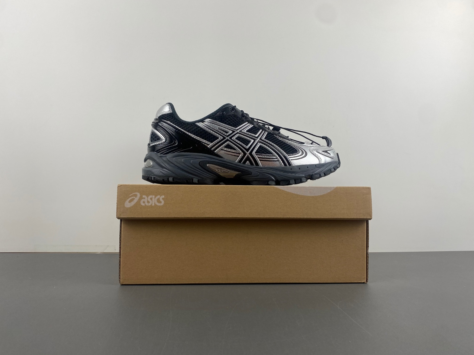 As*ic*s sneaker