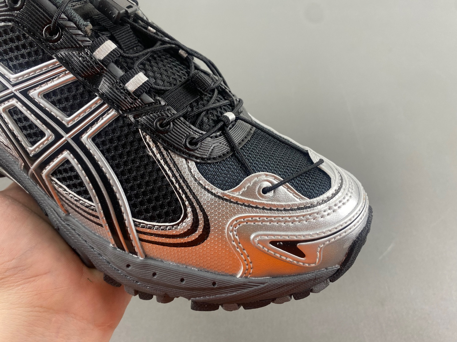 As*ic*s sneaker