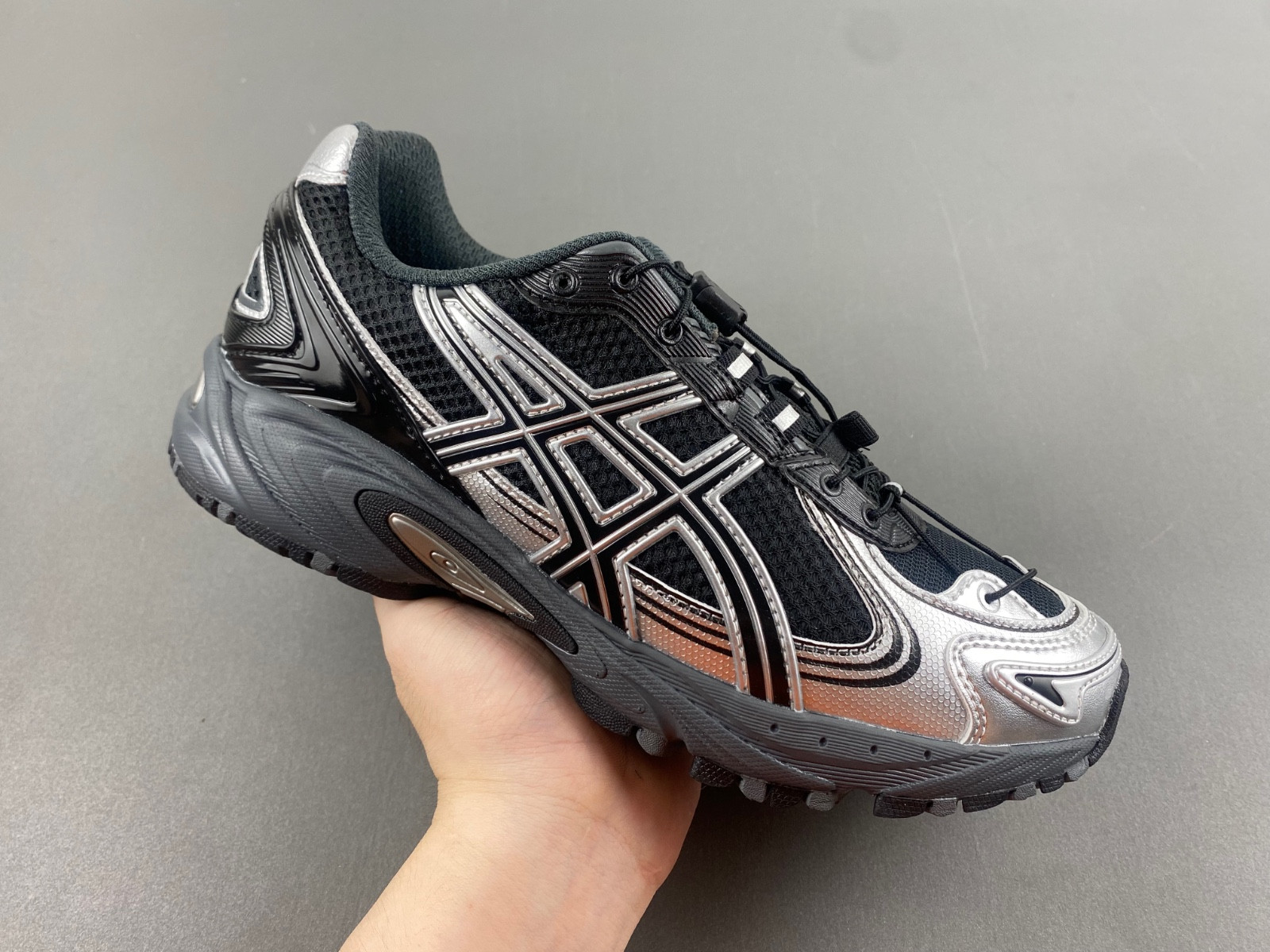 As*ic*s sneaker