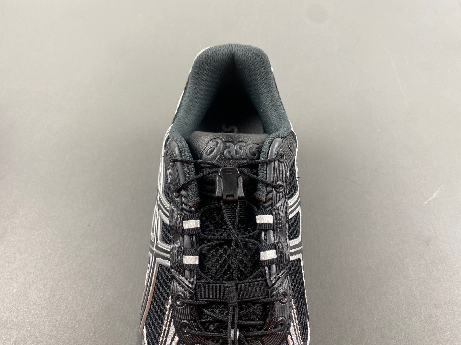 As*ic*s sneaker