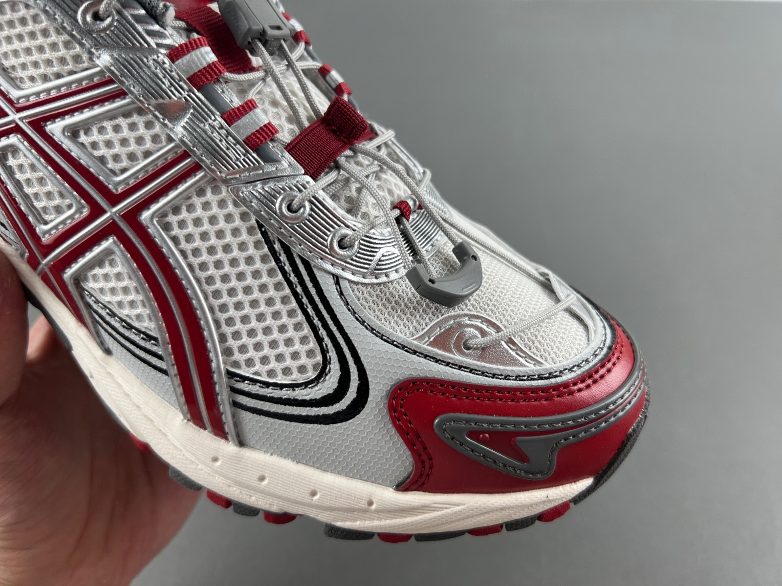 As*ic*s sneaker