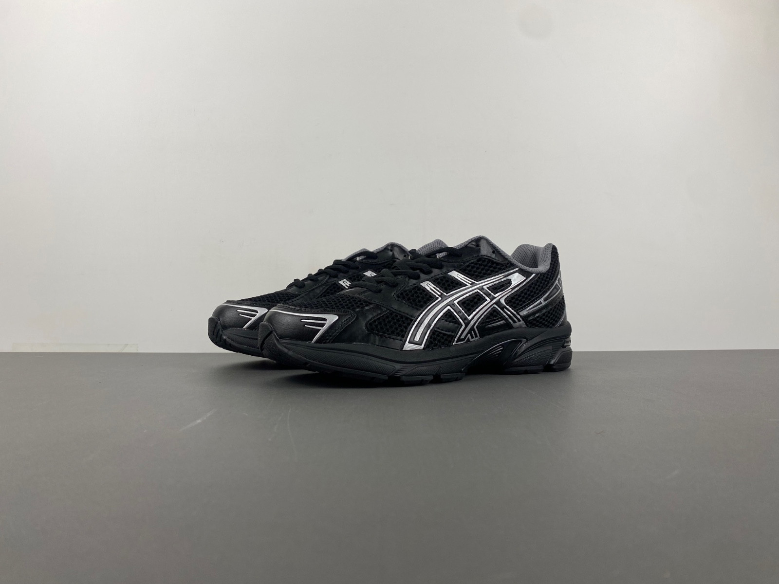 As*ic*s sneaker