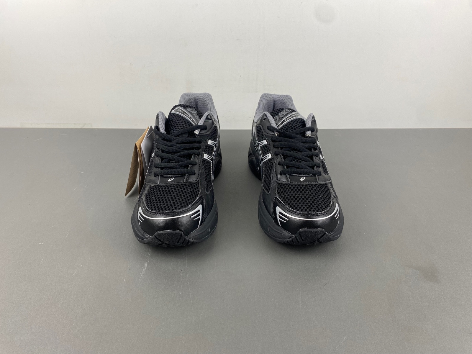 As*ic*s sneaker