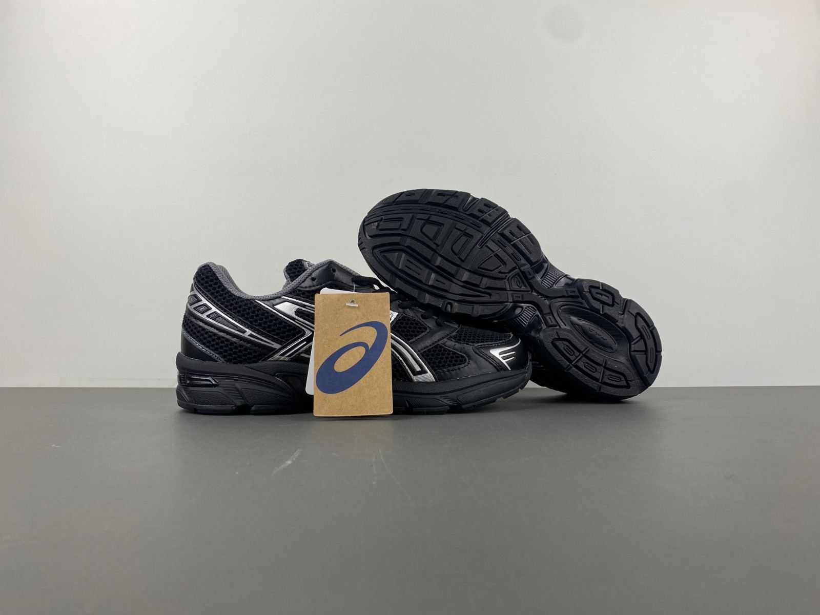 As*ic*s sneaker