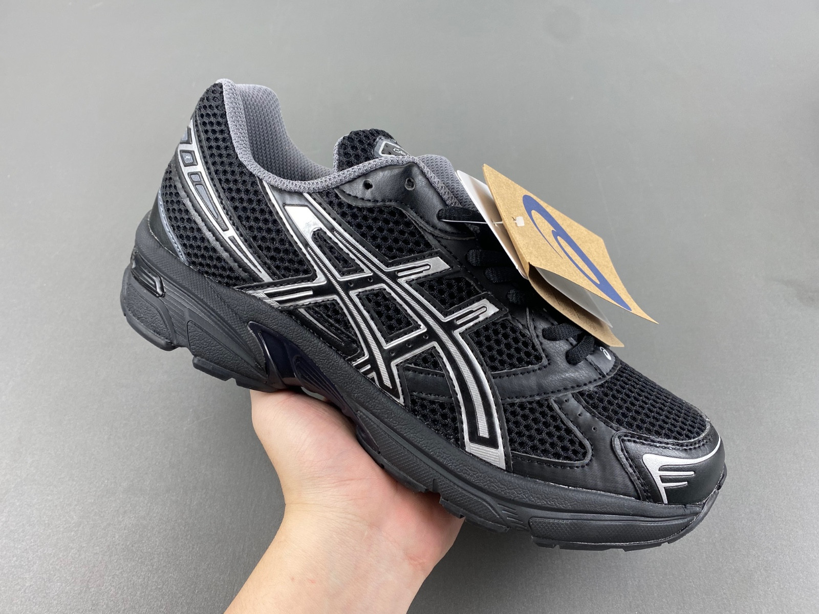 As*ic*s sneaker