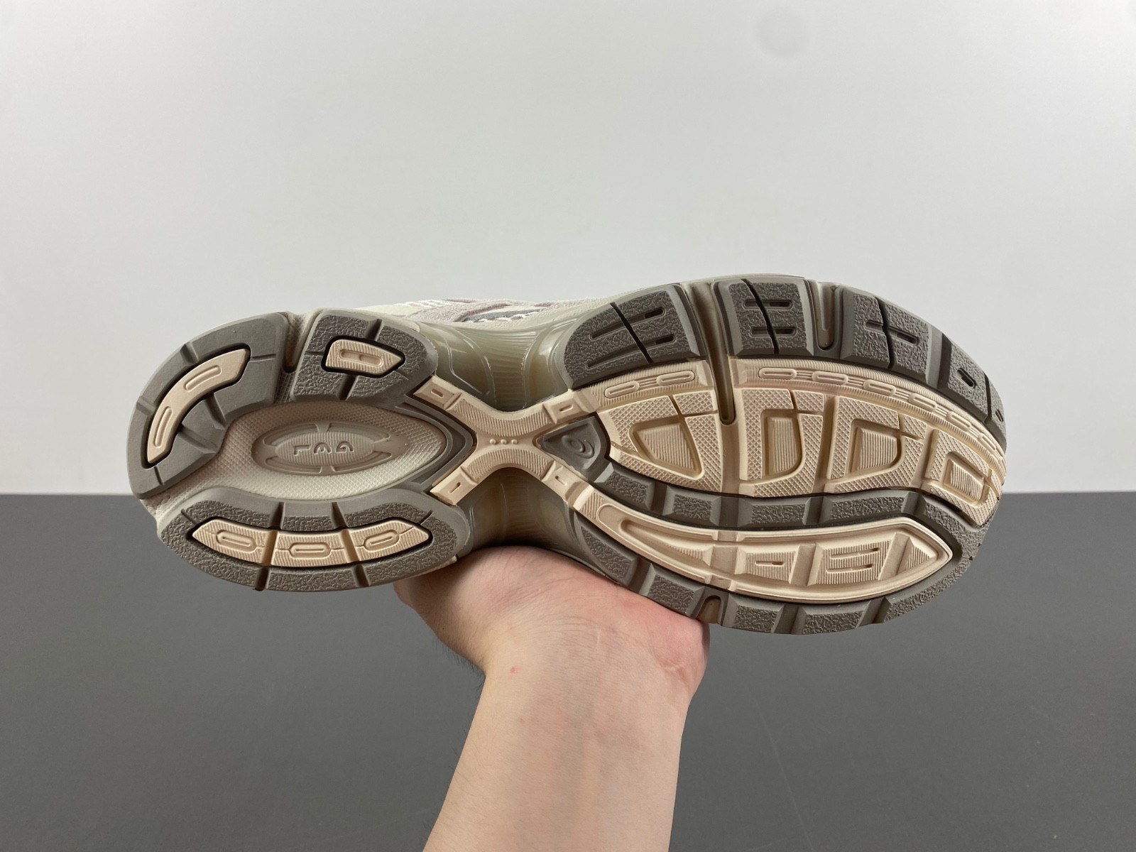 As*ic*s sneaker