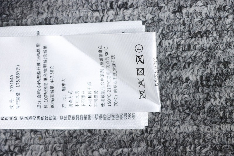 Can*a Go*e coat