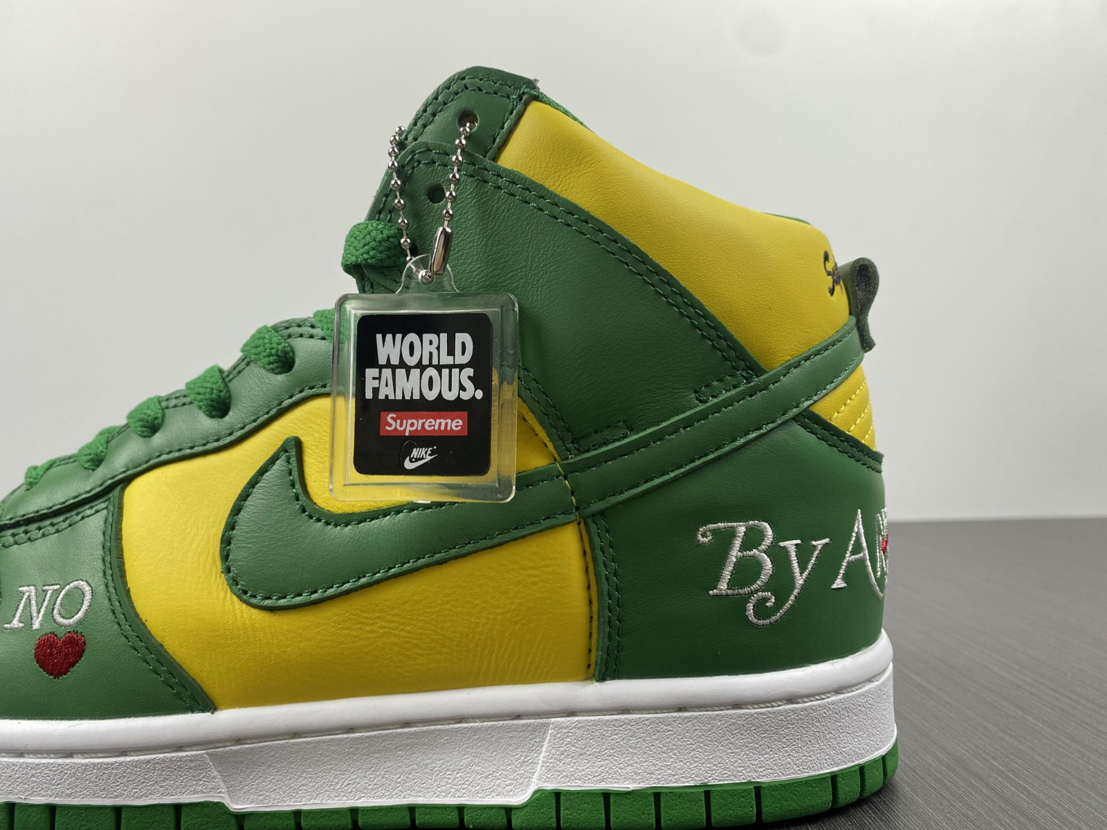Supreme x Nike SB Dunk High “By Any Means” DN3741-700